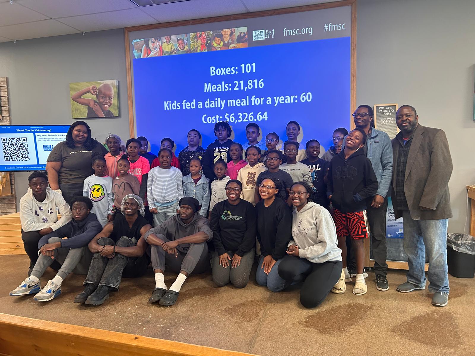 Group photo of volunteers after successful community service event